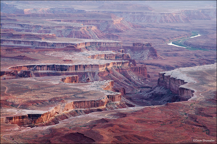 &nbsp;Late afternoon sidelight highlights the White Rim and rugged canyons above the Green River. Green River Overlook in The...